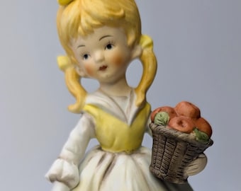 Vintage - figurine - Girl / girl with yellow dress and basket of apples - porcelain - 4'' tall