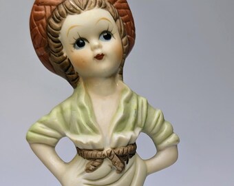 Vintage - Figurine - Girl / Blonde Girl, Green Dress with Log on Head - Porcelain - Marked Taiwan - 6.5''Tall