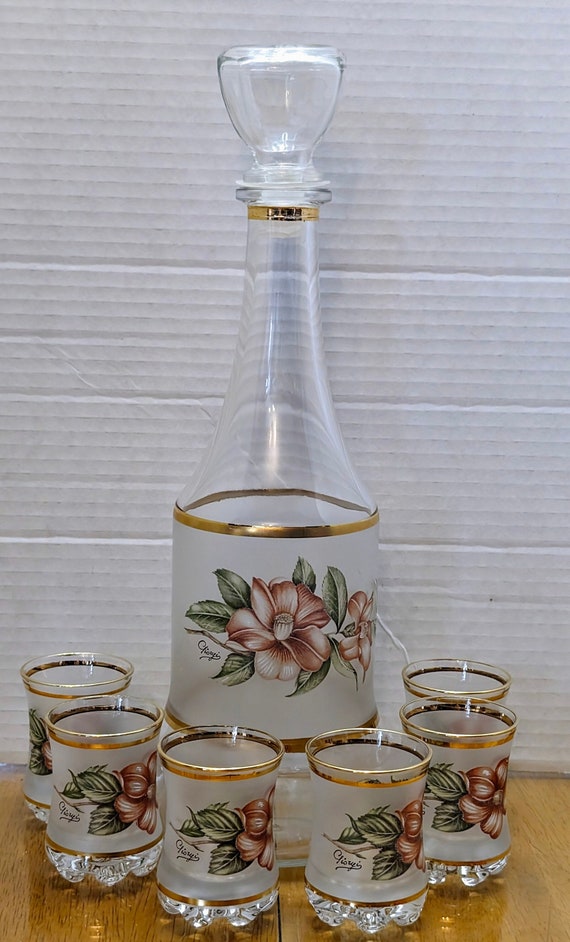 Vintage Decanter Set with it's 6 glasses, the carafe measures 13" tall made in Italy