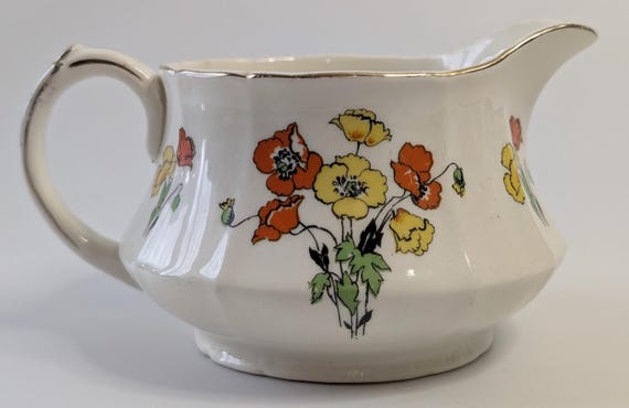 Vintage - Milk jug / Creamer - Meakin - 5.5 inches long x 2.75 inches high - porcelain - England - Vintage