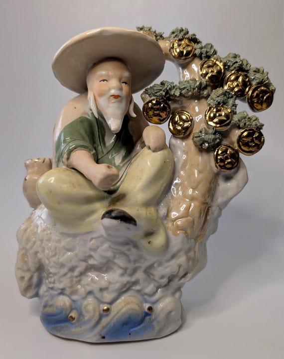 Vintage - Asian Fisherman Figurine under a tree - porcelain - measures 7.5'' high