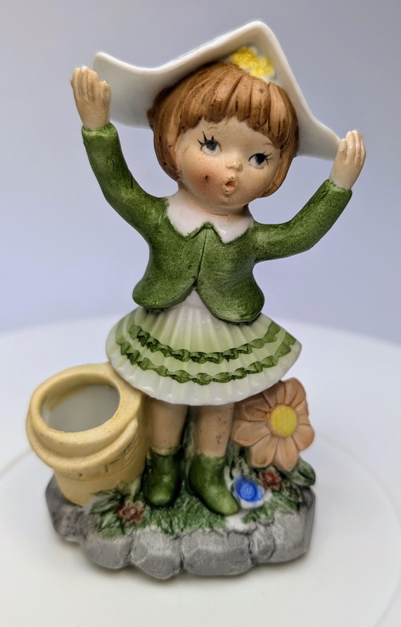 Vintage - Figurine - Girl / Blonde Girl, Green Dress with Log on Head - Porcelain - Marked Taiwan - 4''Tall