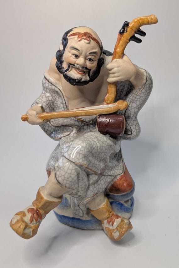Vintage - Chinese / Japanese musician in porcelain - measures 8'' high