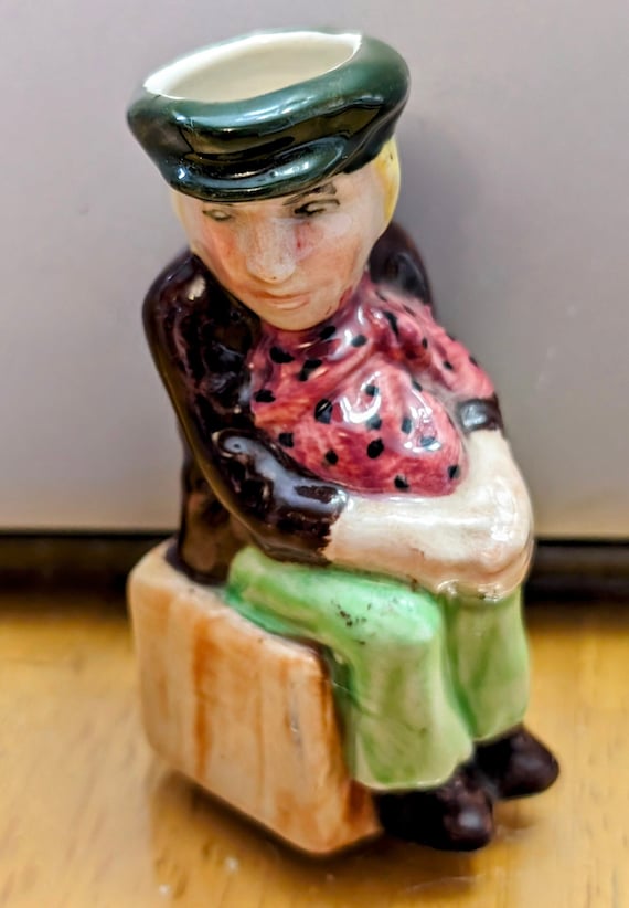 Vintage - Small Jar / Vase - Man Sitting Made England - Measures 2.5" Tall