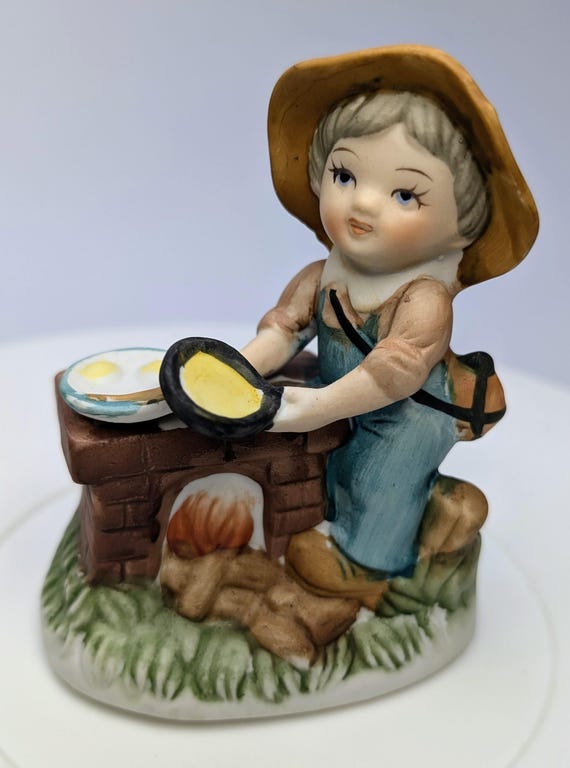Vintage - figurine - boy with table, kitchen - porcelain - 3.75'' tall