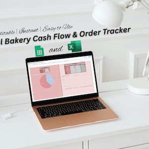 May include: A rose gold laptop displays a cash flow and order tracker spreadsheet for a small bakery. The screen shows charts and graphs in shades of pink and blue. The text on the screen reads "Small Bakery Cash Flow & Order Tracker".