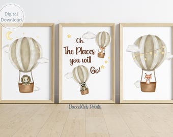 May include: Three framed wall art prints featuring watercolor illustrations of beige and white hot air balloons. The prints show a lion, a raccoon, and a fox in the baskets, with the text Oh, The Places you will Go! and small stars.