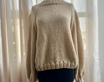 Video pattern for knitting a Winter Sweater with two needles in Spanish