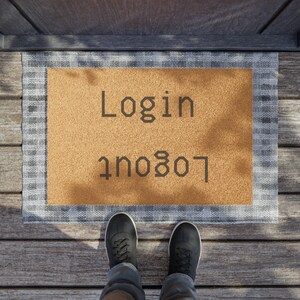 May include: A brown doormat with a white and grey checkered border. The words "Login" and "Logout" are printed in black on the doormat.
