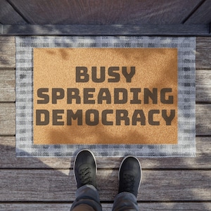 Funny Welcome Doormat: &quot;Busy Spreading Democracy&quot; Coir Fiber Mat