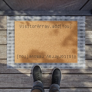 May include: A brown doormat with a white border and the text "VisitorArray.add(You)" and "VisitorArray.remove(You)" in black.