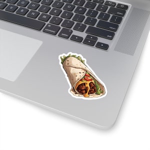 May include: A burrito with a white tortilla, filled with meat, cheese, lettuce, and a red pepper. The burrito is wrapped in foil and has a yellow sauce dripping down the side.