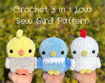 May include: Crochet pattern for three low-sew bird toys. The birds are yellow, blue, and white. The pattern is called "Crochet 3 in 1 Low Sew Bird Pattern".