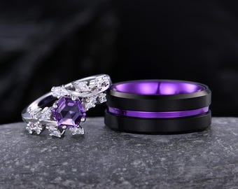 May include: A pair of wedding bands. The woman's ring features a large purple gemstone surrounded by smaller clear stones. The man's ring is black with a purple stripe.