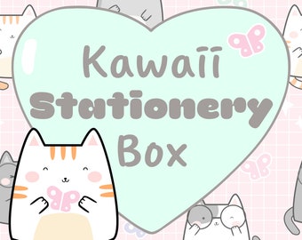 以下が含まれることがあります： かわいいステーショナリーボックスと書かれた薄い緑色のハート型の箱。箱は、かわいい漫画の猫と蝶が描かれたピンクと白の正方形のパターンで囲まれています。