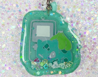 Leafy Bulb Gamer Keychain: Retro Console Shaker Charm