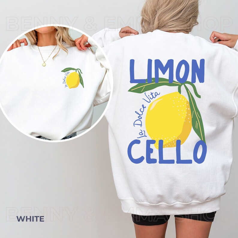 May include: White sweatshirt with a lemon graphic and the text "Limon Cello La Dolce Vita" printed on the back.
