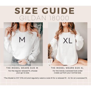 May include: Size guide for Gildan 18000 sweatshirts. The model is wearing a size M for a relaxed fit and a size XL for an oversized fit. The model is 5'10" (178 cm) tall.