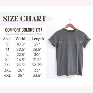 May include: Size chart for a garment-dyed heavyweight t-shirt. The chart shows the size, width in inches, and length in inches for sizes S through 4XL.