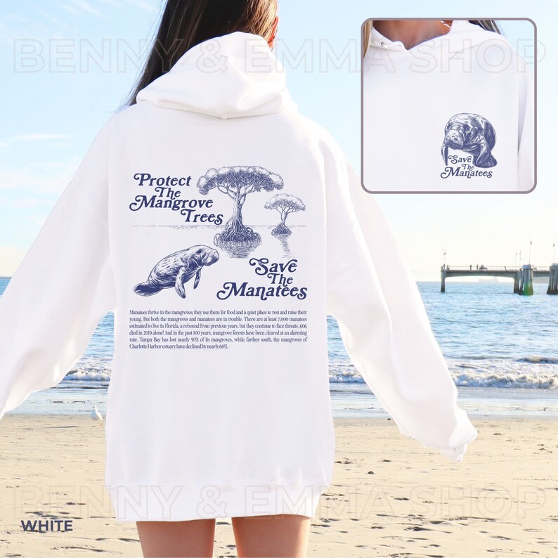May include: White hooded sweatshirt with a blue graphic print of a manatee swimming in a mangrove tree. The text "Protect the Mangrove Trees" and "Save the Manatees" is printed on the sweatshirt.