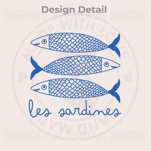 May include: Three blue stylized sardines swimming in a row with the text "les sardines" below them.