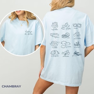 May include: A light blue t-shirt with the text "always al dente" on the front and a variety of pasta shapes on the back. The shirt is made of a soft, comfortable fabric and is perfect for everyday wear.