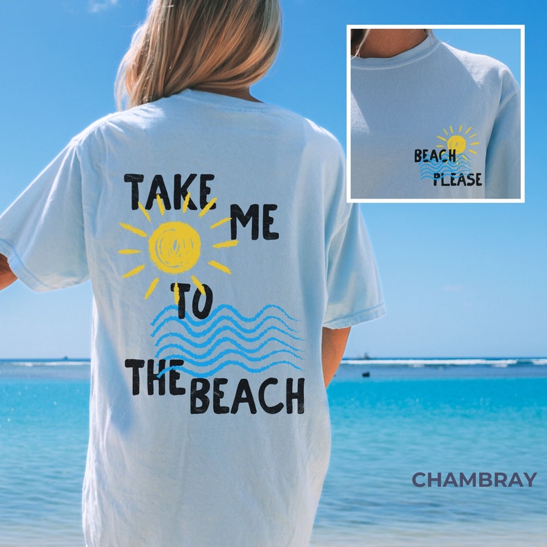 May include: Light blue t-shirt with the text "Take Me To The Beach" in black lettering. The text is accompanied by a yellow sun and blue waves. The back of the shirt has the text "Beach Please" in black lettering with a yellow sun.