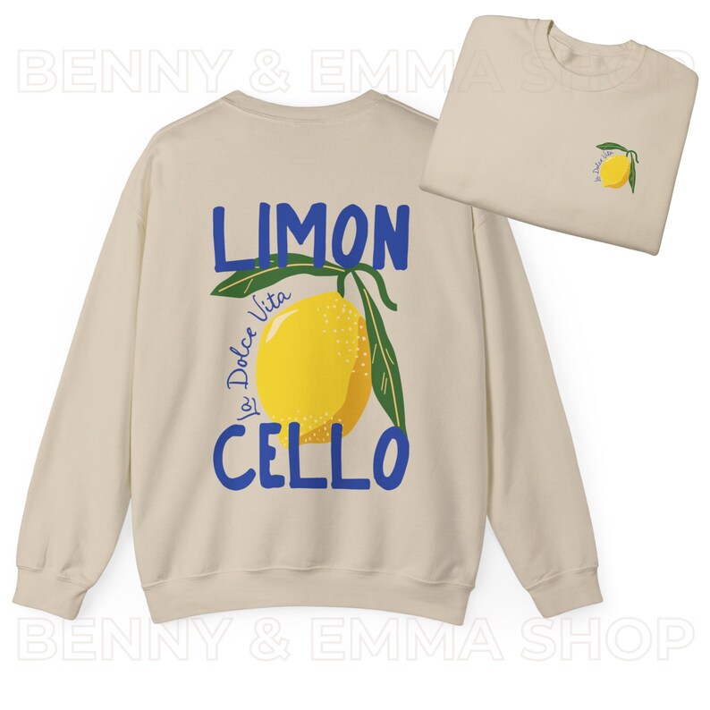 May include: A beige sweatshirt with a blue and yellow lemon graphic and the text "LIMON La Dolce Vita CELLO" printed on the back.