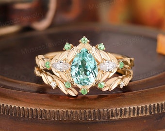 Green unique pear shaped moissanite engagement ring set Natural tsavorite leaf engagement ring Vintage marquise green moissanite ring set