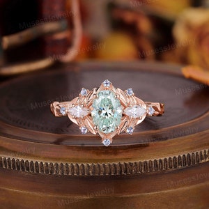 Vintage oval green moissanite engagement ring set 14k gold engagement ring set Unique natural sapphire leaf ring set Bridal wedding set ring image 7
