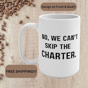 May include: White ceramic mug with a large handle, featuring the text "NO, WE CAN'T SKIP THE CHARTER." in black. The mug is on a wooden surface with coffee beans scattered around it. The text "Design on Front & Back!!" is at the top.
