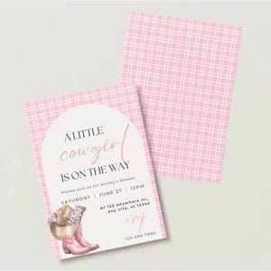 May include: A rectangular baby shower invitation card featuring a pink and white plaid pattern, a white arched center panel, and text that reads A LITTLE cowgirl IS ON THE WAY. It includes a watercolor illustration of a cowboy hat and pink boots.