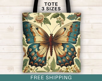 May include: A tote bag featuring a large, colorful butterfly with blue, brown, and white wings. The butterfly is surrounded by floral designs in shades of green, yellow, and red. The bag has the text "TOTE 3 SIZES" printed on the top.
