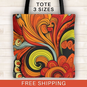 May include: A tote bag with a colorful abstract design featuring swirls and curves in shades of orange, yellow, red, and blue on a black background. The text "TOTE 3 SIZES" is printed at the top of the bag.