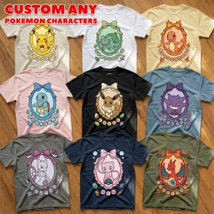 May include: A collection of t-shirts featuring various Pokémon characters. Each shirt displays a different character within a decorative oval frame, with the character's name below. The text "CUSTOM ANY POKEMON CHARACTERS" is at the top.
