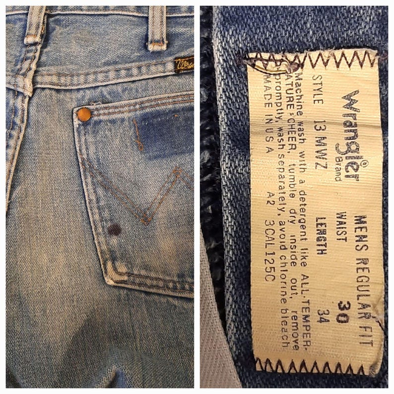 May include: Light blue denim jeans featuring a back pocket with a copper-colored rivet and a stitched W design. The interior tag reads Wrangler Brand, Style 13 MWZ, Waist 30, Length 34, and includes care instructions and Made in U.S.A. text.