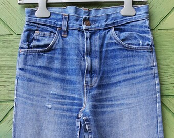 Vintage 60s early 70s Big E Levis Orange Tab Flare jeans size 26