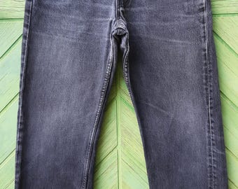 90s vintage Levis 501 jeans faded black USA size 26