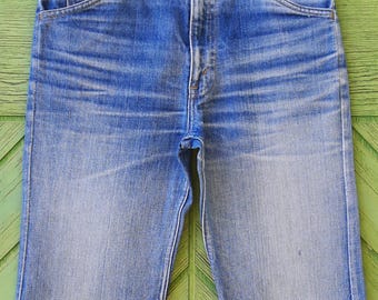 Vintage 1970s Levis orange tab flare jeans size 24-25