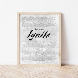 May include: A black and white image of a book cover with the title "Ignite" in a large, stylized font. The text on the cover is a passage from the book, describing a scene where a character is preparing to give a speech.