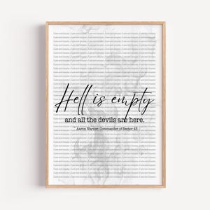 May include: A framed print with a light wood frame. The print has a white background with a repeating text pattern. The words "Hell is empty and all the devils are here" are written in cursive. The author is Aaron Warner.