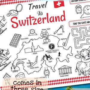 May include: A white placemat with black line art of Switzerland, featuring skiers, landmarks, and a maze. Text includes "Travel to Switzerland," "Find 7 Differences," and "Comes in three size - 11x17, 8.5x11, A4." A hand is drawing with a blue pencil.