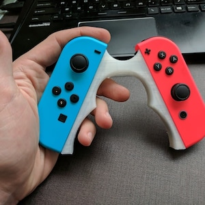 Uchwyt Joycon Boomerang-Style