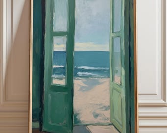 May include: An art print of a seascape, viewed through open green doors. The painting depicts a sandy beach, ocean waves, and a light blue sky. The artwork is framed in a thin, light brown wooden frame.