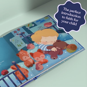 May include: A children's book illustration shows a young child hugging a teddy bear. The book's page features a blue background with cartoon animals and the text: "The perfect introduction to faith for your child."