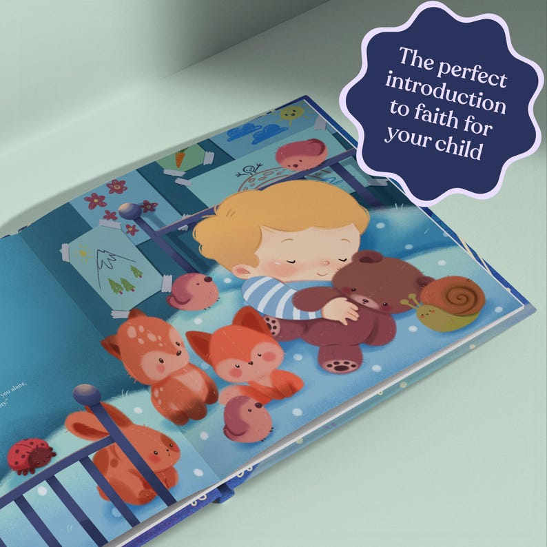 May include: A children's book illustration shows a young child hugging a teddy bear. The book's page features a blue background with cartoon animals and the text: "The perfect introduction to faith for your child."