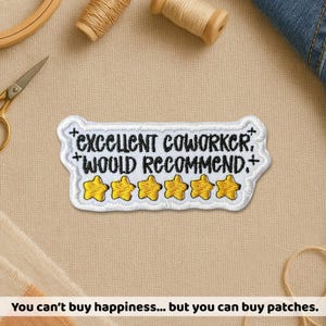 May include: Embroidered patch with the text "EXCELLENT COWORKER, WOULD RECOMMEND" and five gold stars. The patch has a white border and is on a beige background. The phrase "You can't buy happiness... but you can buy patches" is at the bottom.