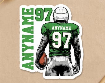 May include: A sticker depicting a football player in a green jersey with the number 97 and the name "ANYNAME". The player is holding a football. The sticker also includes the text "CUSTOM PORTRAITS & PLAYFUL, POSITIVE STICKER ART".