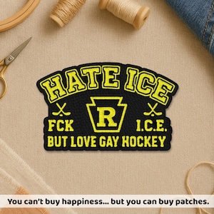May include: Black embroidered patch with yellow text that reads "HATE ICE" above "FCK" and "I.C.E." with a yellow "R" in the center. The patch also says "BUT LOVE GAY HOCKEY". The text "You can't buy happiness... but you can buy patches" is at the bottom.
