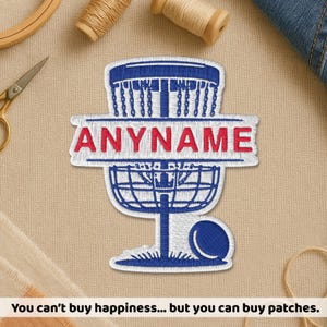 May include: Embroidered patch with a blue and white disc golf basket design and the red text "ANYNAME". The patch includes a disc and the phrase "You can't buy happiness... but you can buy patches."